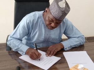 Jigawa state Chief Judge, Umar Sadiq signing the revised law on administration of criminal justice.
