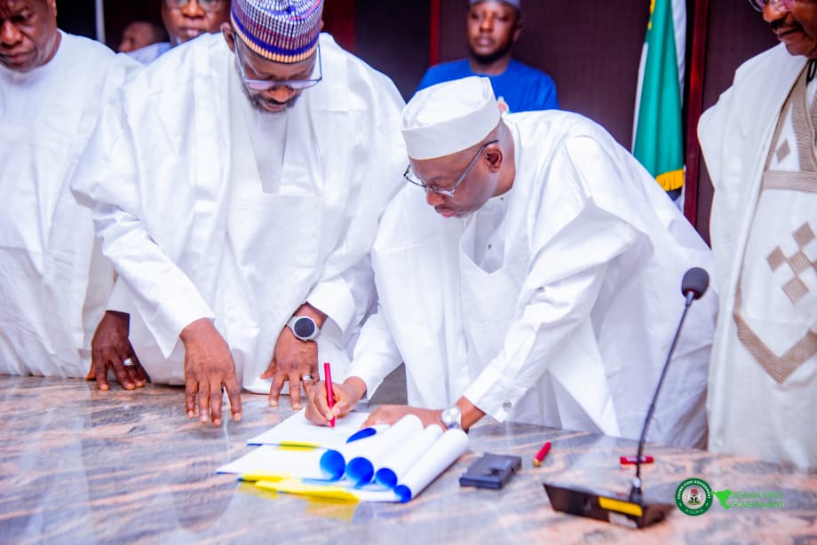 Gov. Umar Namadi signing the 2026 budget into law.